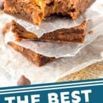 Pinterest graphic for caramel brownies. Text says "The best caramel brownies simplejoy.com" Image shows individual caramel brownies stacked with wax paper separating.