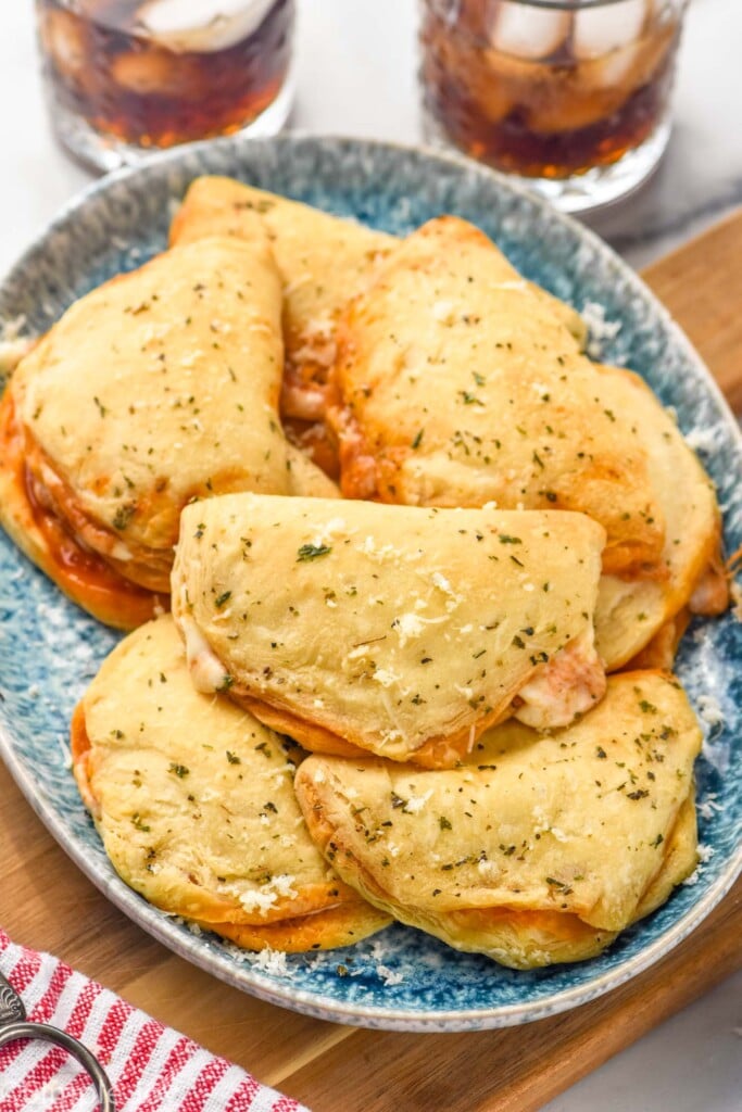 a plate full of mini calzones