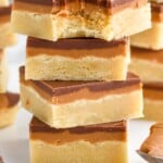 Photo of a stack of Cookie Butter Bars with a bite taken out of the top bar. - 19