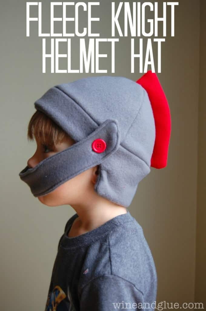 little boy in a homemade fleece hat shaped like a knight's helmet