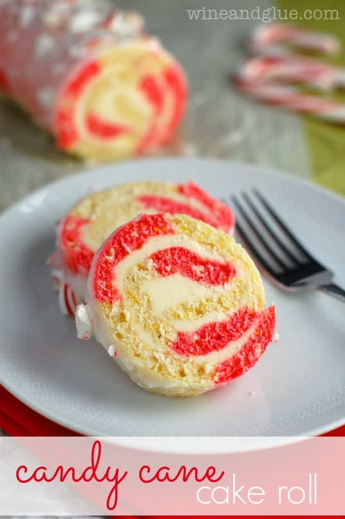 Two slices of the Candy Cake Roll. The cake portion is swirled with red coloring. 