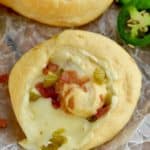 This Jalapeño Popper Pinwheels recipe is the best appetizer to bring to a party! Full of cream cheese, cheese, jalapeños, and bacon, they are absolutely delicious! - 7