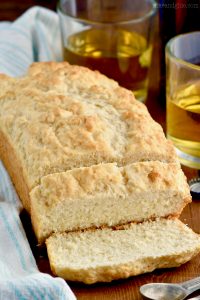 Three Ingredient Beer Bread couldn't be simpler to make! This beer bread recipe is the easiest way to make homemade bread. Watch our video recipe tutorial!