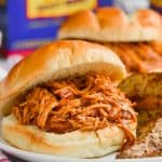 root beer slow cooker bbq chicken sandwich close up on a plate - 7