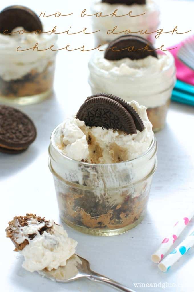 small mason jar full of cookie dough cheesecake with bite missing - 5