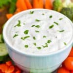 close up view of a healthy vegetable dip recipe with cut up vegetables around it - 26