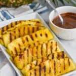 grilled pineapple spears on a platter - 15