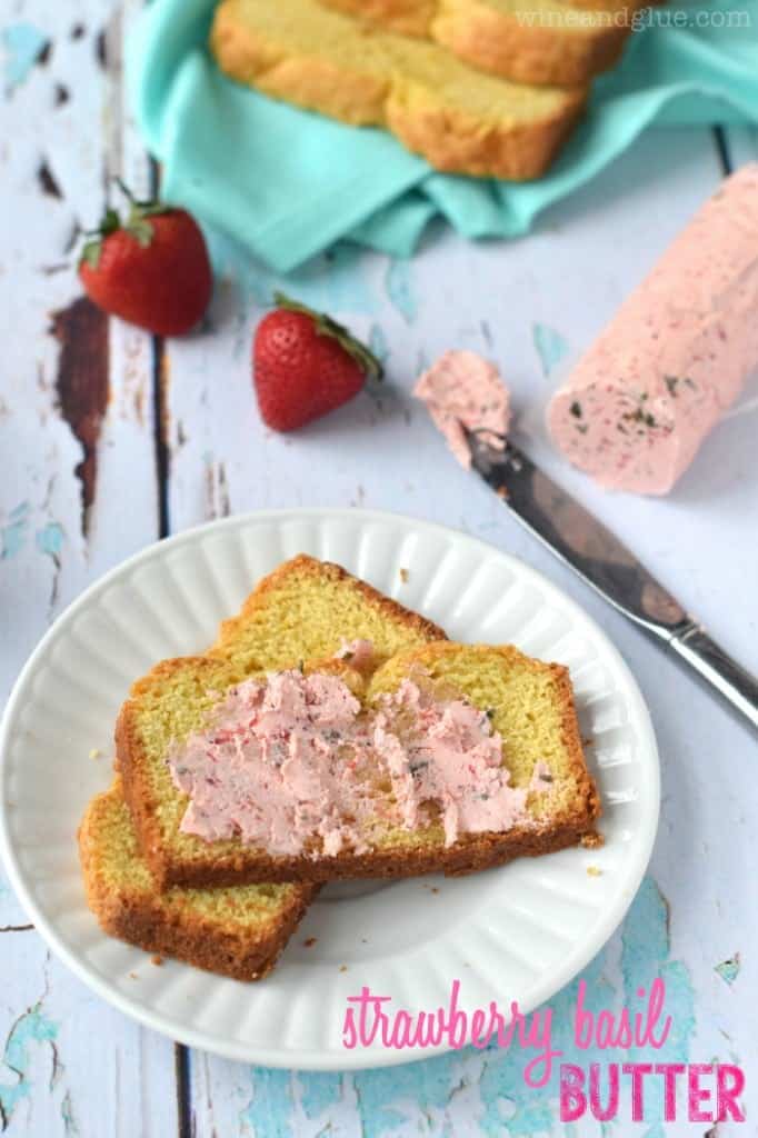 On a piece of toast, the Strawberry Basil Butter has a pink tint with speckles of green from the basil.