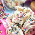 small pile of birthday cake bark made from white chocolate and topped with sprinkles, says “birthday cake bark” - 5