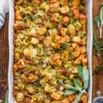 overhead view of the best homemade stuffing recipe garnished with fresh sage - 23