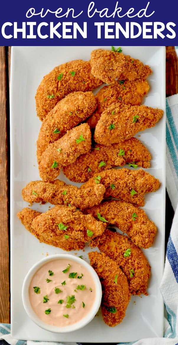 baked chicken tenders on a white rectangular plate and garnished with fresh parsley
