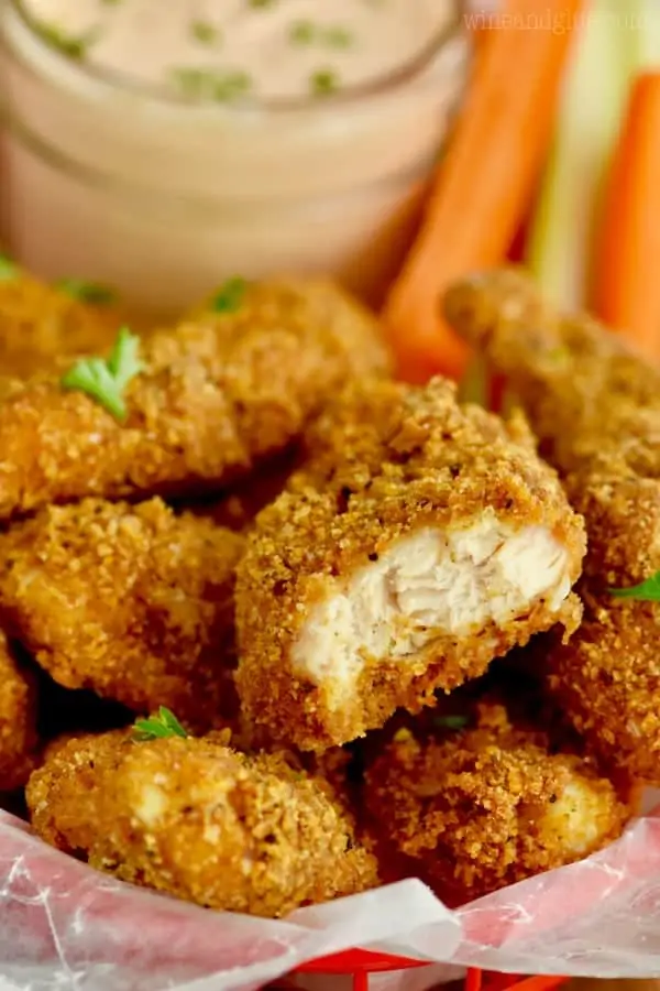 This Healthy Baked Chicken Tenders Recipe with Easy Dipping Sauce need to be part of your weeknight dinner line up!  This chicken tender recipe is so delicious and way lighter than traditional fried chicken tenders and barbecue sauce.