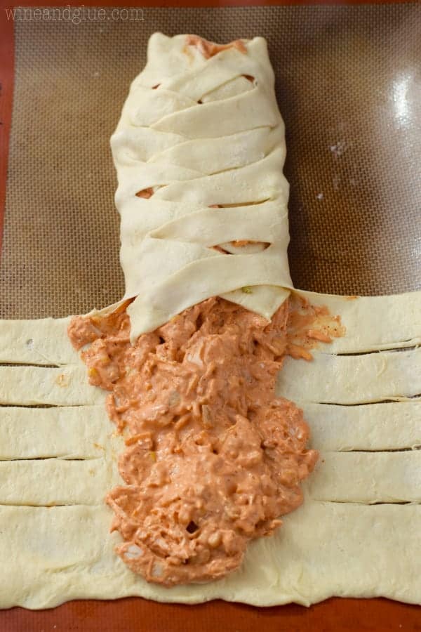 Braid the dough over the filling.