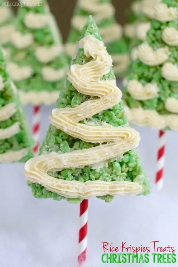 The Rice Krispies Treats Christmas Tree have a green color and shaped as a triangle with white frosting zig zagging. 