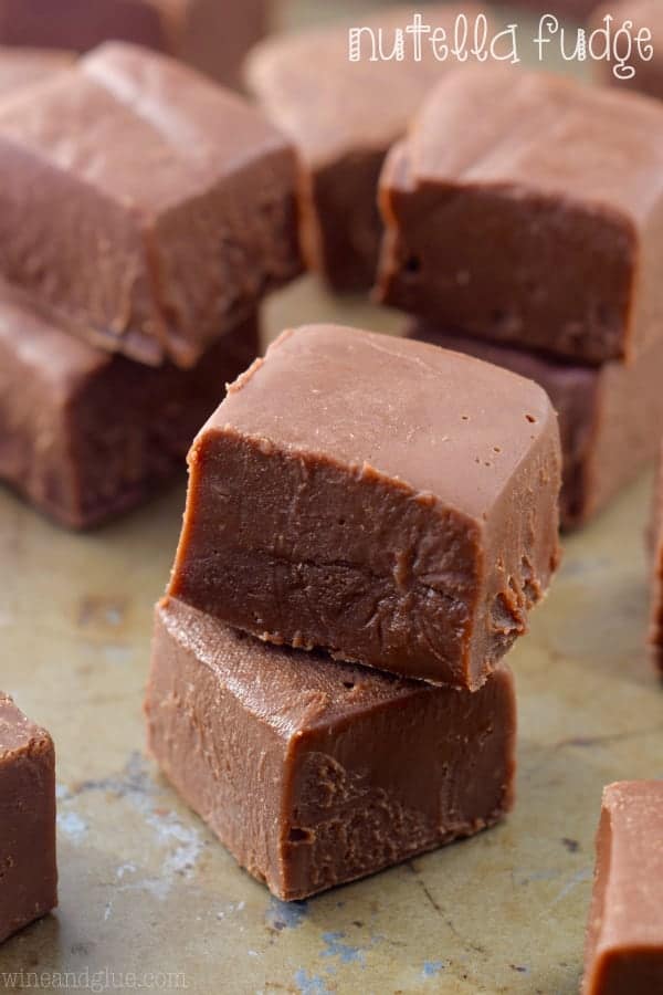 The Nutella Fudge are cut into little cubes and stacked on top of each other. 