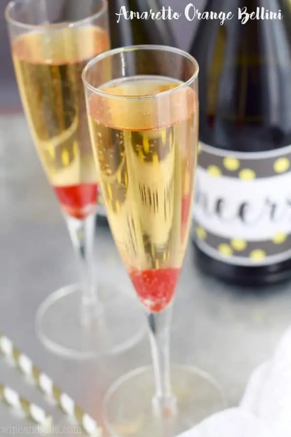 In champagne flukes, the Amaretto Orange Bellini has a maraschino cherry a the bottom of the glass as garnish. 