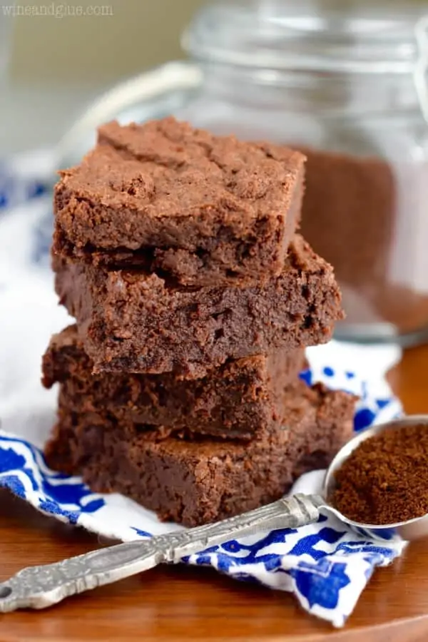 The Mocha Fudge Brownie is stacked showing the moist fudge middle and crisp top. 