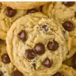 overhead photo of a large pile of peanut butter chocolate chip cookies