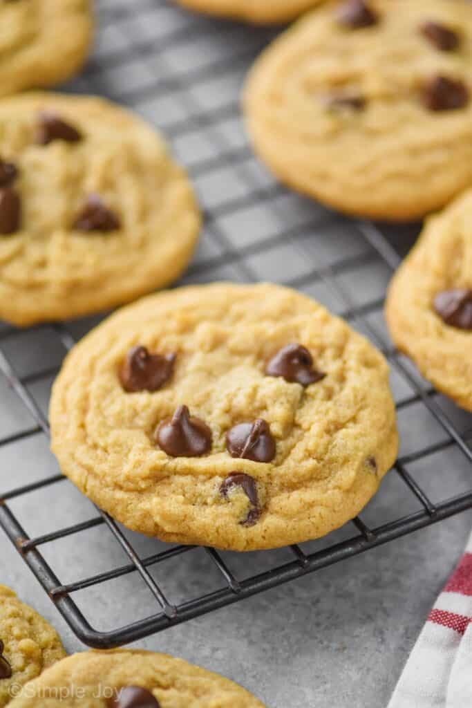 a peanut butter chocolate chip cookie cooling on a wire rack