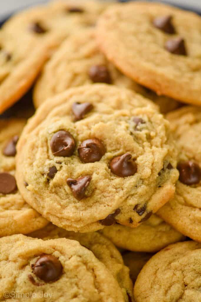 side view of a pile of peanut butter chocolate chip cookies
