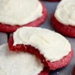 Red cookie with white frosting.