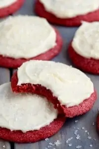 Red cookie with white frosting.