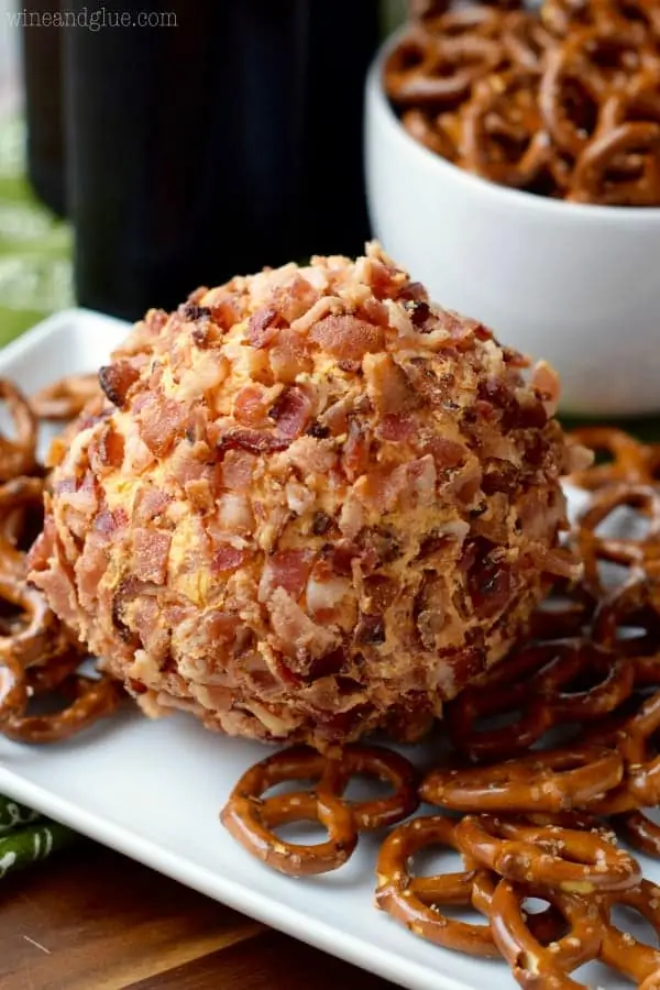 The Buffalo Bacon Cheeseball has minced bacon as its crust and surrounded by pretzels. 
