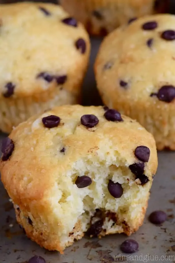 The One Bowl Chocolate Chip Muffins has mini chocolate chips with a large bite into it. 