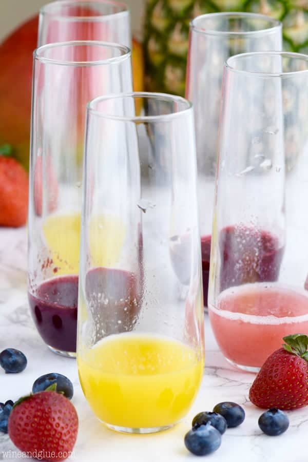 In long glasses, a small amount of the syrup flavoring is poured into the glass. 