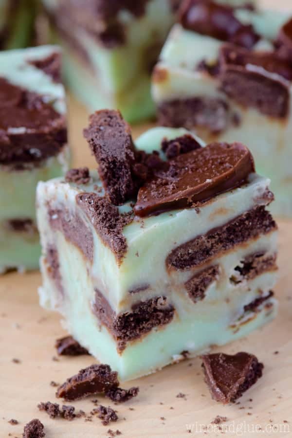 A small cube of the Grasshopper Fudge has a mint green tint with speckles of the grasshopper cookies. 