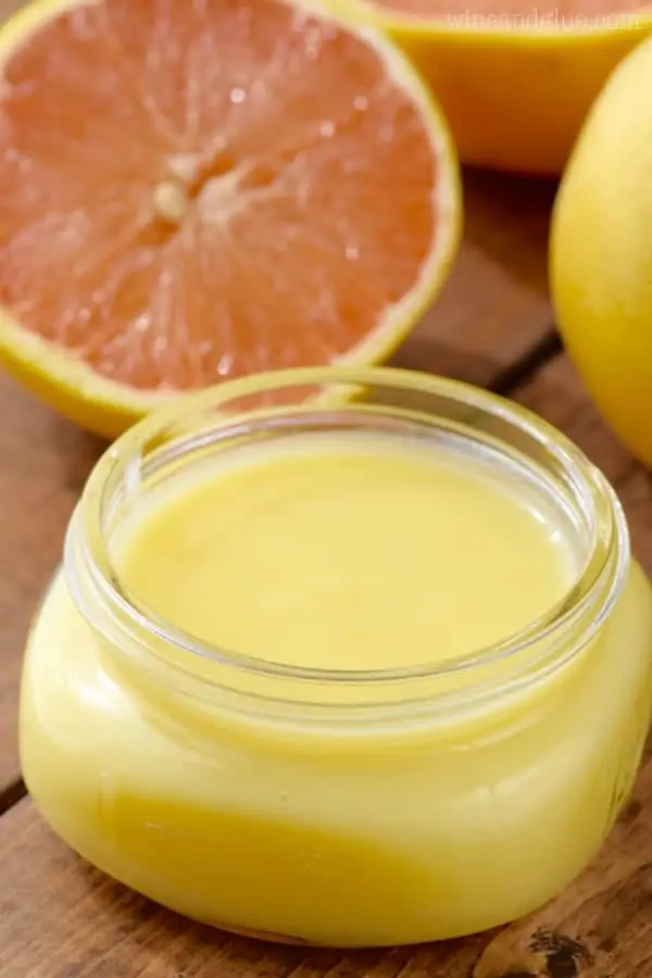 In a small mason jar, the Grapefruit Spread has a yellow pastel color. 