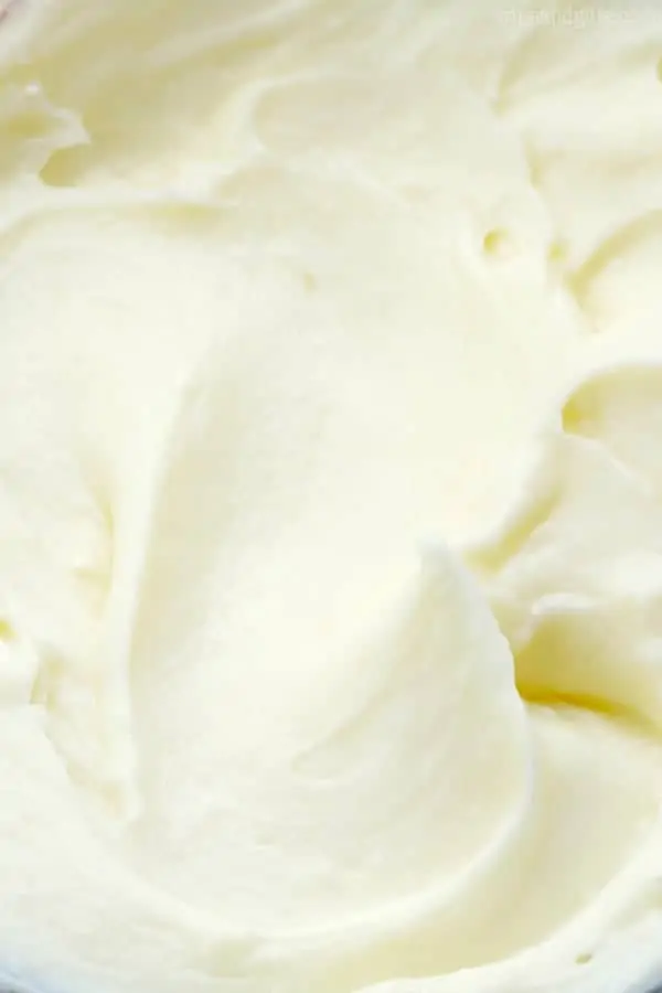 close up view of the fluffy cream cheese frosting