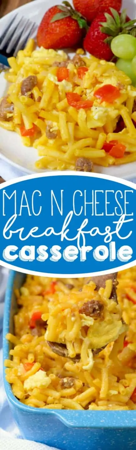On a white plate, the Mac N' Cheese Breakfast Casserole has chunks of sausage, eggs, and sliced red peppers with a side of strawberries and grapes. 
