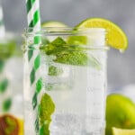 a mason jar with a low calorie mojito in it garnished with a lime wedge - 5