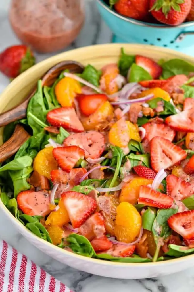 a side view of a bowl of strawberry salad