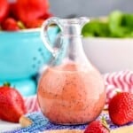 a small bottle of strawberry spinach salad dressing - 15