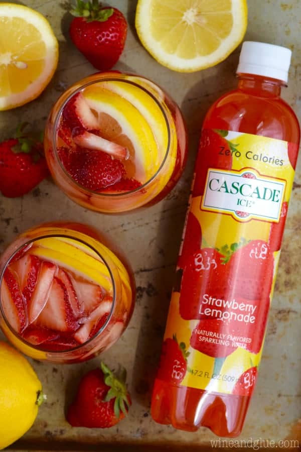 Overhead photo of two Strawberry Lemonade Spritzers next to Cascade Ice's Strawberry Lemonade. 