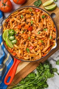 overhead view of one pot southwestern chicken alfredo pasta in skillet