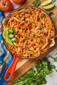 overhead view of one pot southwestern chicken alfredo pasta in skillet