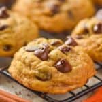 close up of a pumpkin chocolate chip cookie on a wire cooling rack - 15