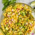 overhead view of a bowl of fresh corn salsa mixed together