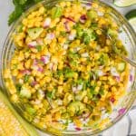 overhead view of a bowl of fresh corn salsa mixed together - 9