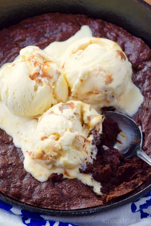 An overhead photo, of the Skillet Brownie with melted Caramel Gelato. 