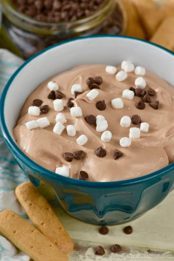 Bowl of chocolate dip with marshmallows and mini chocolate chips. 