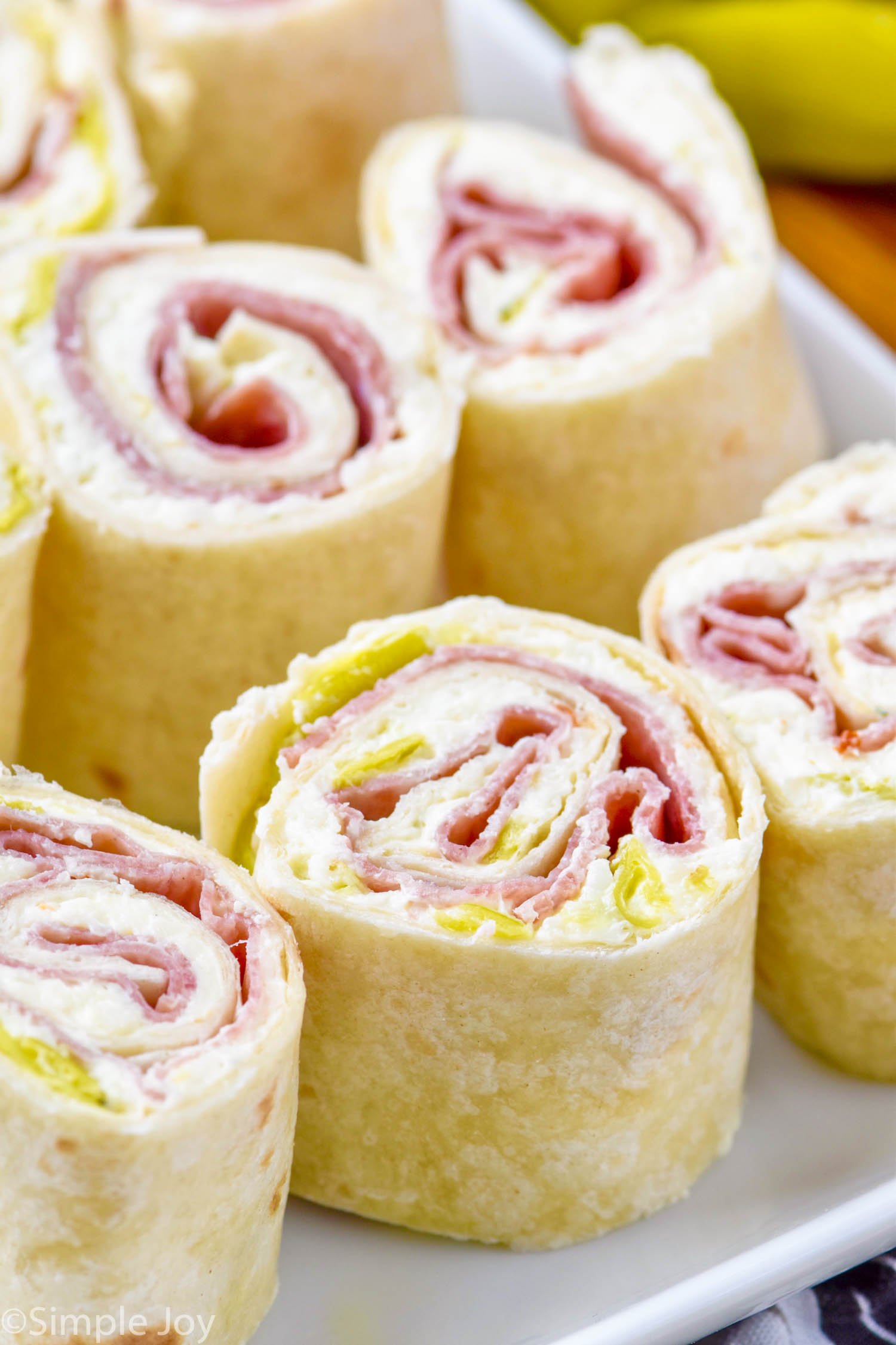 close up of an italian pinwheel on a plate