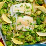pinterest graphic of an overhead of sheet pan cod and vegetables