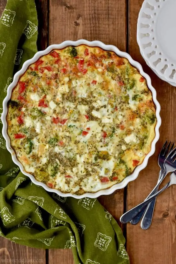 An overhead photo of the Crustless Vegetable Quiche in a ceramic pie pan 