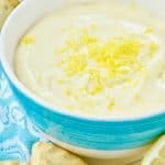 Lemon dip in bowl with shortbread and lemons sitting next to the bowl - 6