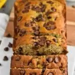 chocolate chip banana bread sliced on a cutting board