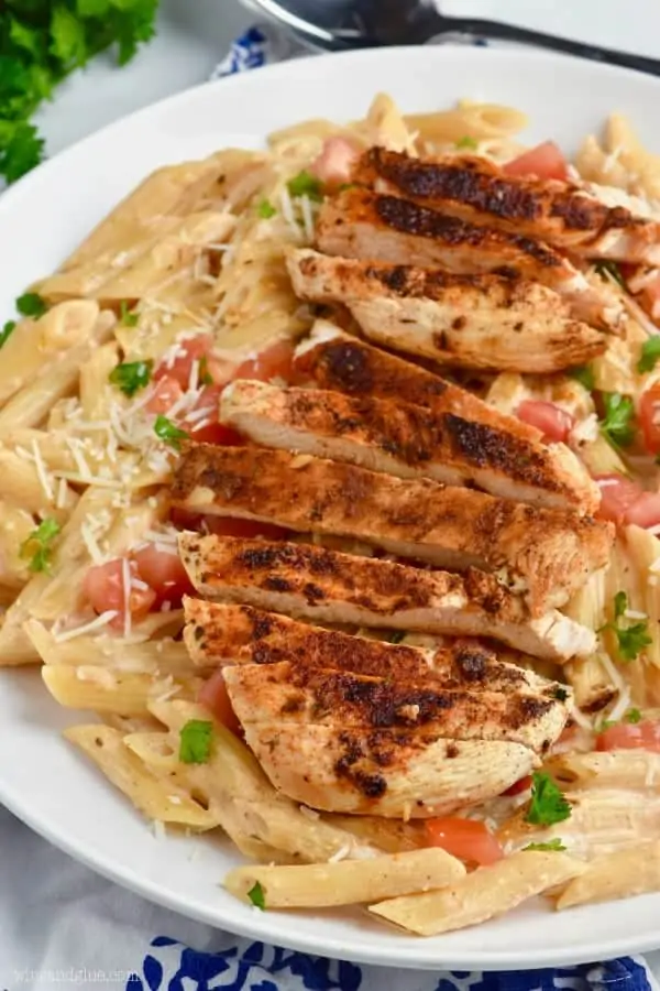 Creamy Cajun Chicken Pasta comes together so fast! This easy chicken dinner recipe is the perfect combo of spicy and creamy!